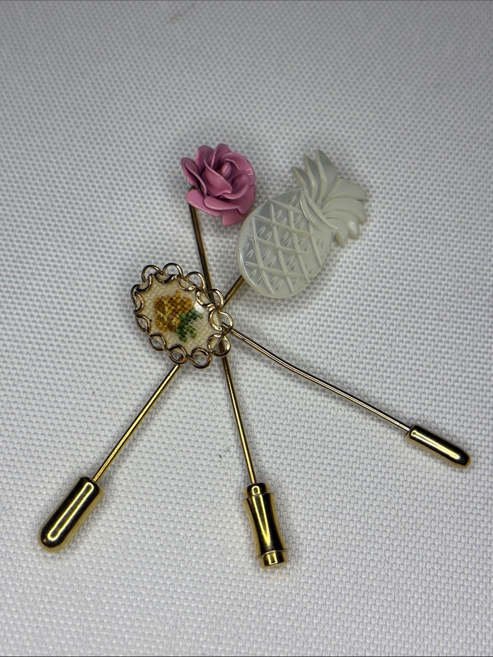 Bundle of three Goldtone floral pineapple style hat pins